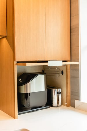 Custom appliance garage hides air fryer and toaster when not in use, VanderBeken Remodel, 2023