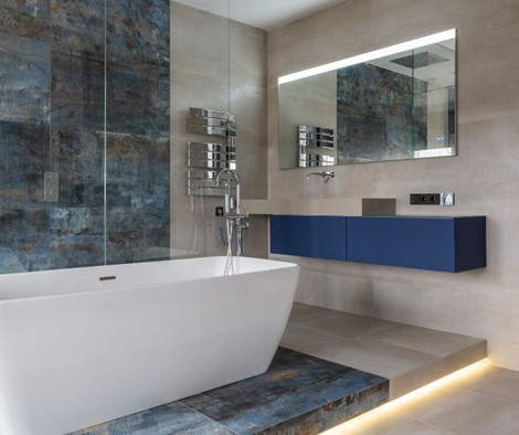 Ceramic tile with backlight footer