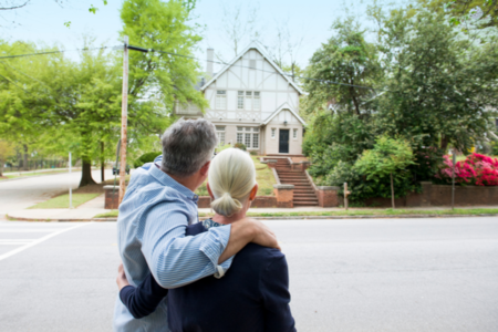 Couple looking at house