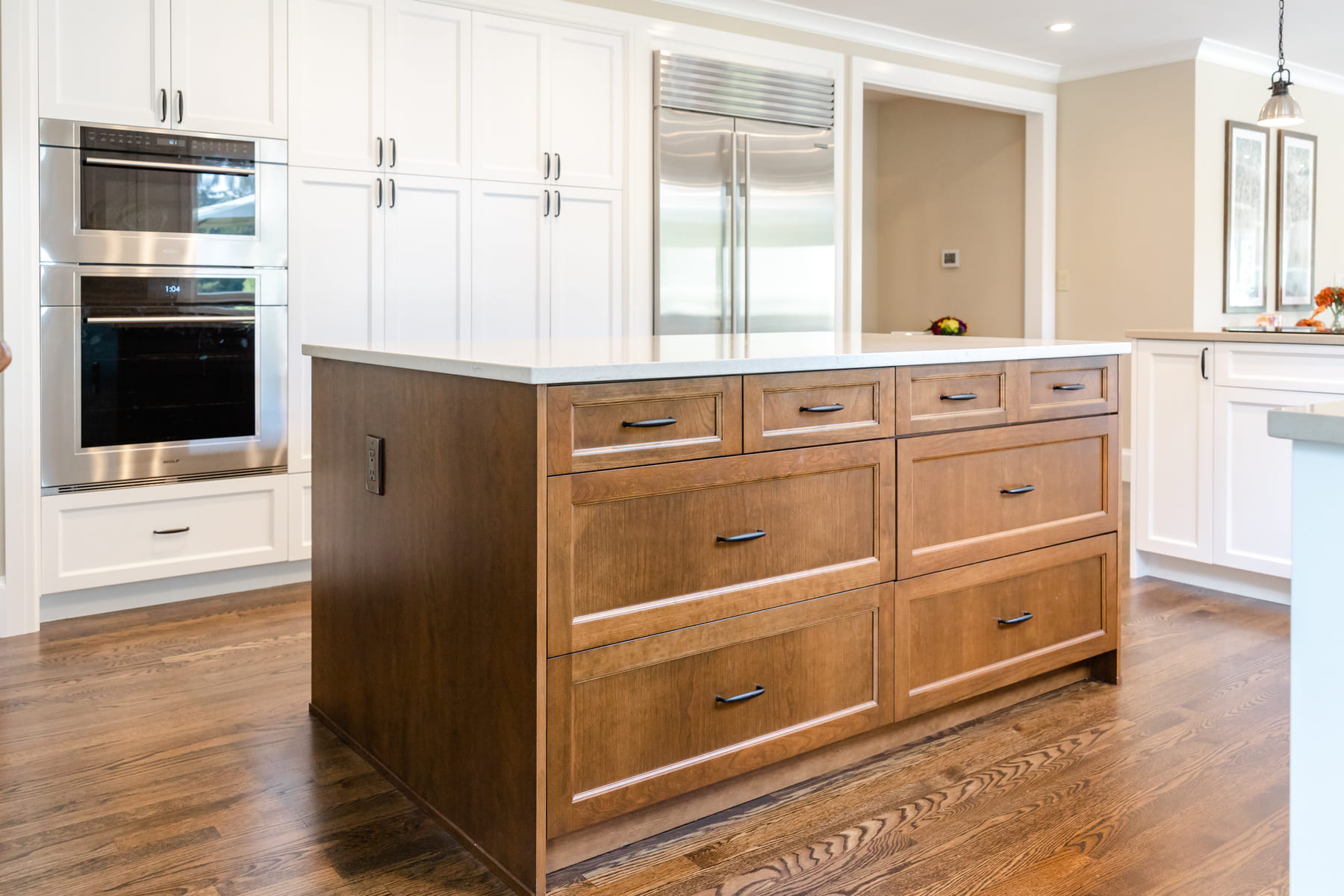 Kitchen Island with white shaker cabinet pantry behind, VanderBeken Remodel, Mill Creek, 2022