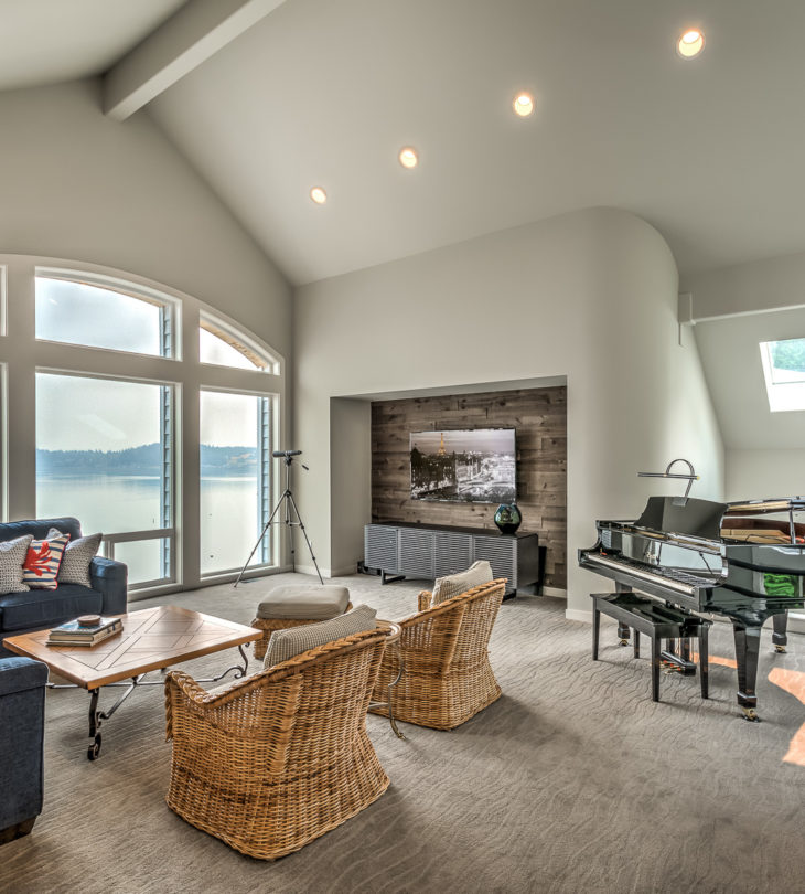 Living Room with Vaulted Ceilings in Whole Home Remodel by VanderBeken Remodel